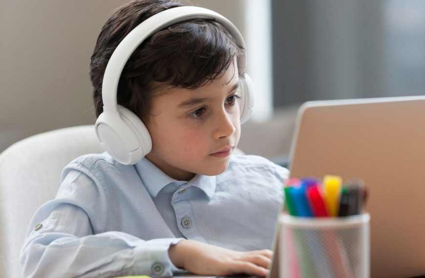 Boy focused on e-learning.